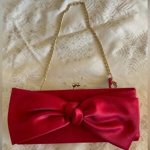 Kate Landry red bow clutch